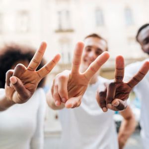 People – Intercultural Friends Showing Peace