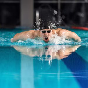 Sports – Male Swimmer Swimming Butterfly