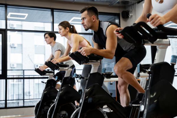 Sports – People Doing Indoor Cycling