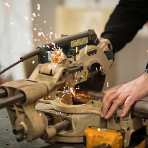 Technology – Technician Worker Cutting Metal