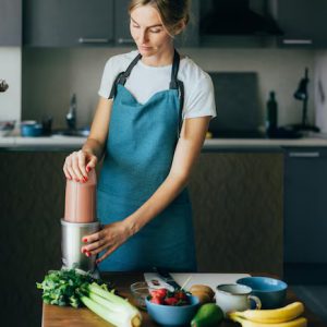 Food – Woman Preparing Smoothie Kitchen