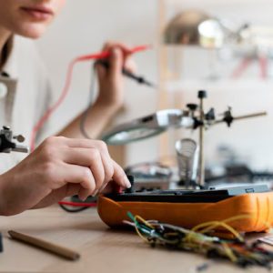 Technology – Young Female Inventor Creating